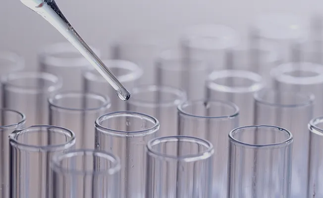 Pipette dropping the liquid into test tube 2026 03 24 23 44 01 utc Blue